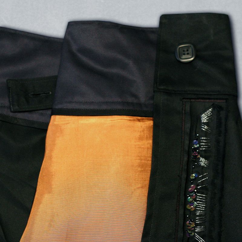embroidered-by-hand black pleated kilt