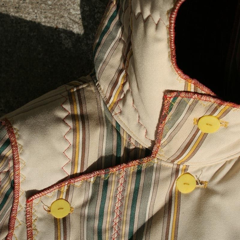 quilted recycled coat with stripes
